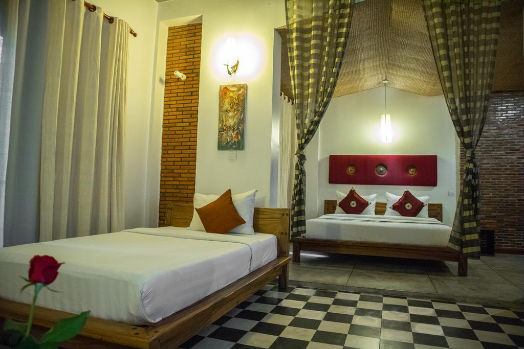 Casa Villa Independence Phnom Penh Quarto foto
